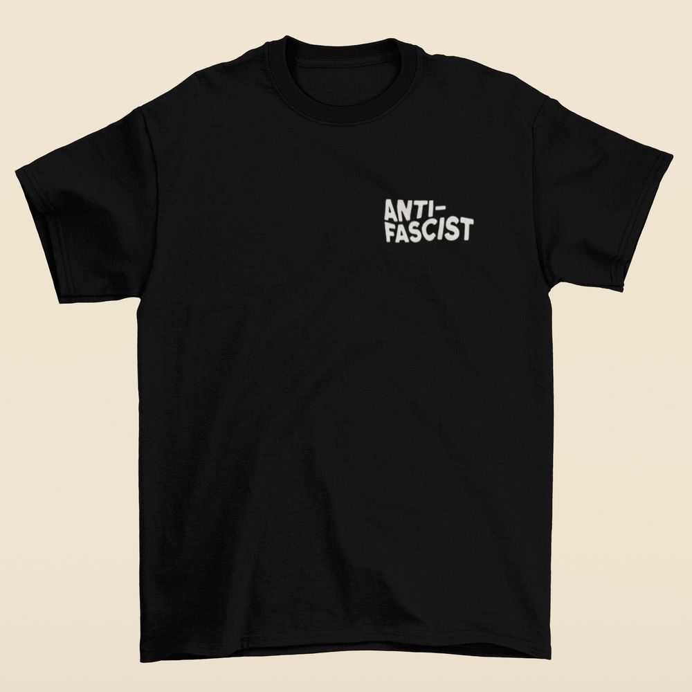 black T-shirt with white “anti-fascist” pocket logo