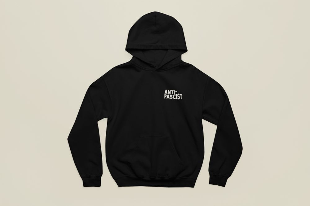 black hoodie with white “anti-fascist” pocket logo