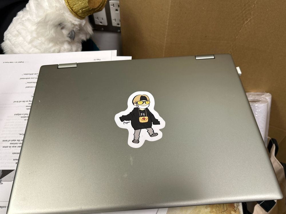 Traitor laptop with adorable waddling Yoongi sticker covering the mark of shame (Dell logo)