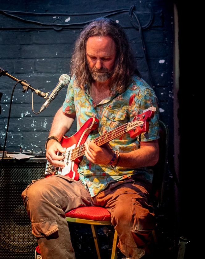Jamie R Hawkins on bass guitar performing at The Pump,Trowbridge
