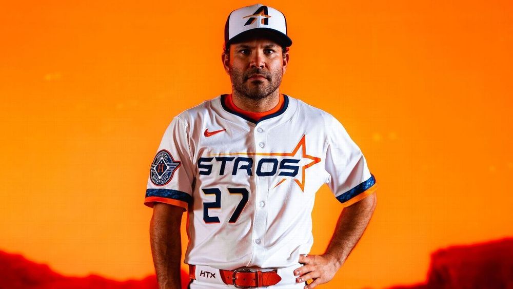 Jose altuve in a white Astros uniform