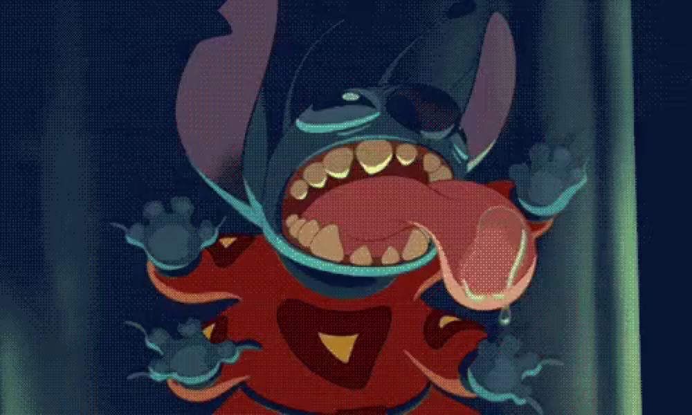 a cartoon character from the movie lilo and stitch is standing in the dark .