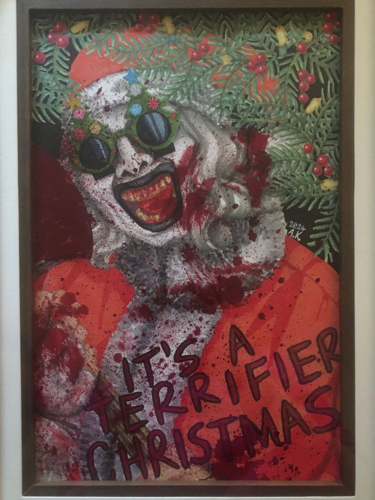 Marker portrait of Art the Clown from Terrifier 3 dressed in a santa suit and christmas tree sunglasses holding an axe and grinning at the viewer, splattered in blood, with holly garland christmas lights across the top. 