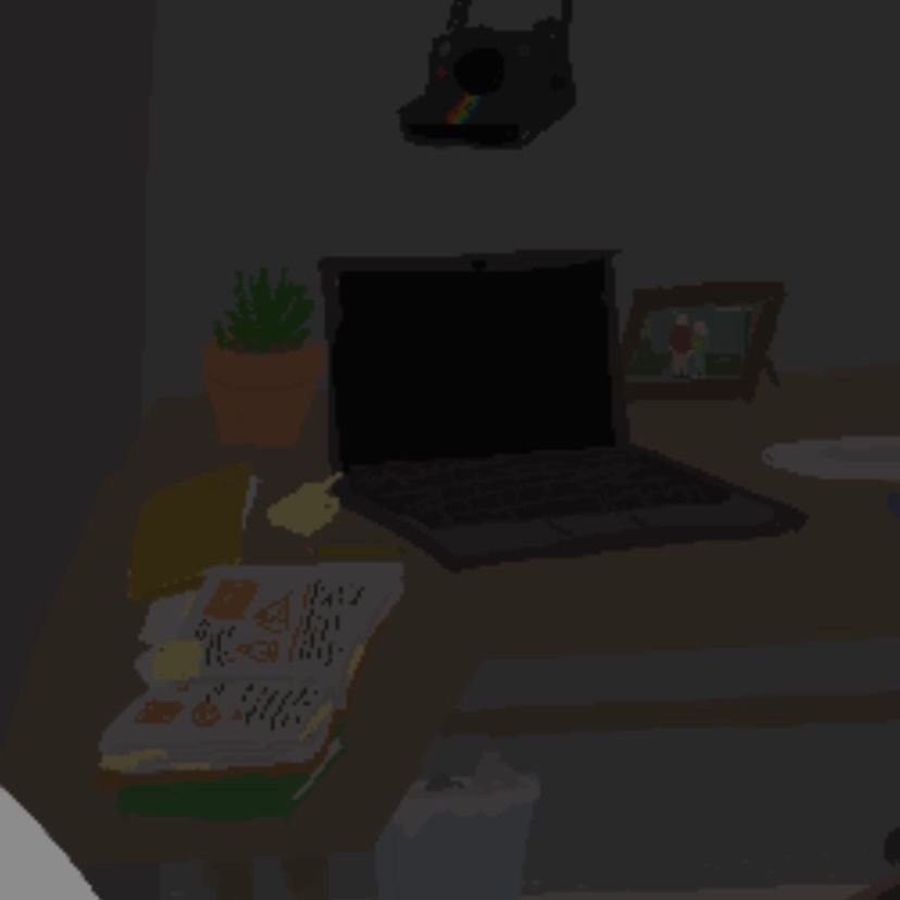 a close-up detail of peter's desk. a math textbook with lots of post-it notes in and on its pages is open, with another textbook underneath it and some papers and a folder behind it. a stack of post-its sits next to his open-but-off laptop; a potted plant is in the corner behind it. a framed photo of ben and may sits behind the computer, and a plate is visible off the side. his full trash can is underneath. you also get a better look at his black polaroid hanging above everything.