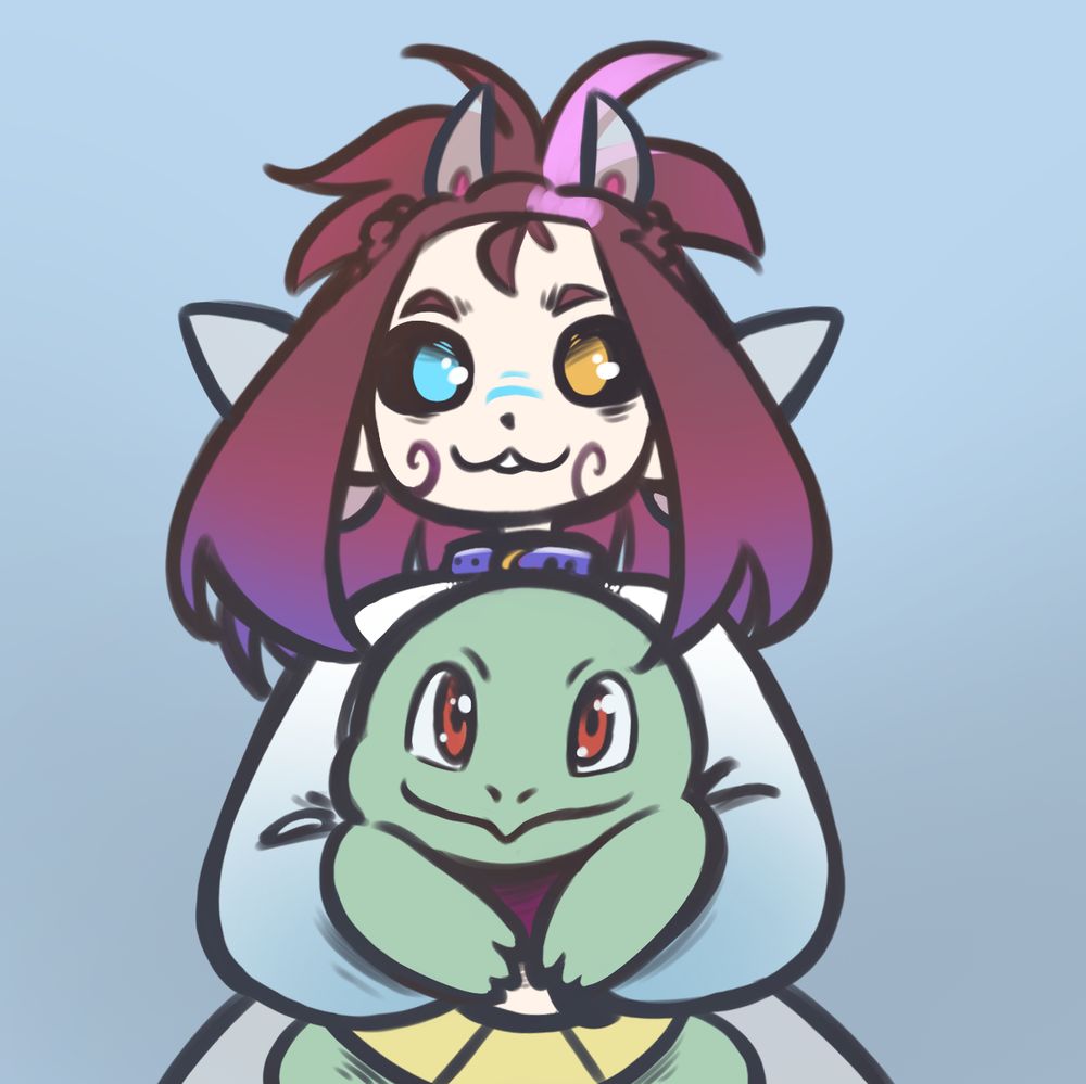 Bali and Squirtle smile at the viewer
