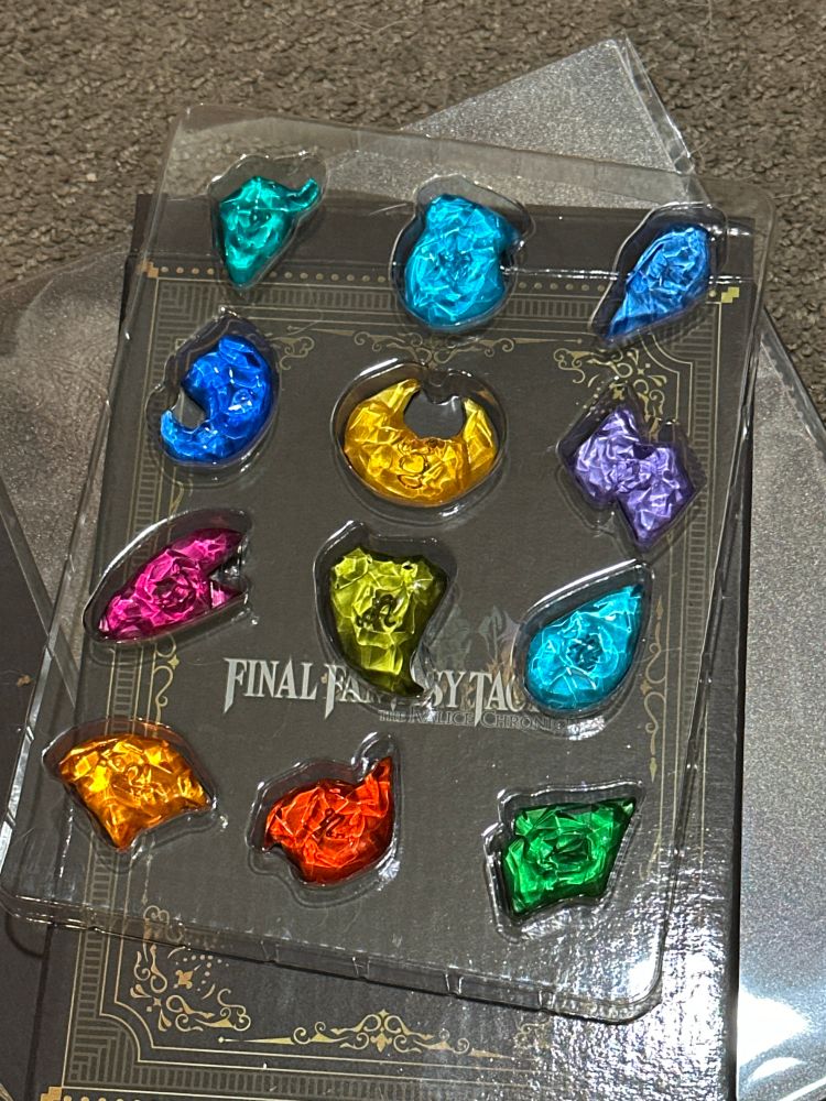 12 acrylic magnets in bright candy colors of each zodiac stone 