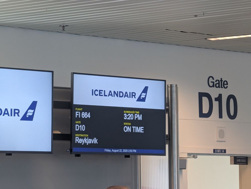 Airport reader board listing my flight to Iceland 