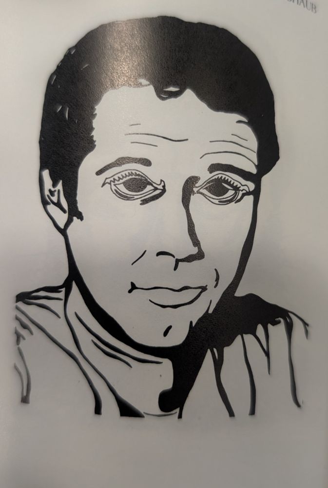 A terrifying caricature of Chevy Chase. 