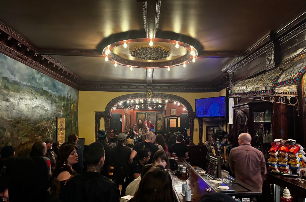 A crowd gathers to watch a band play music in Shute’s bar in Calumet, Michigan. 