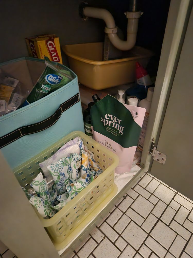 Period products under the sink
