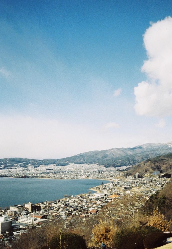 View of Lake Suwa and the surrounding community from a nearby park.