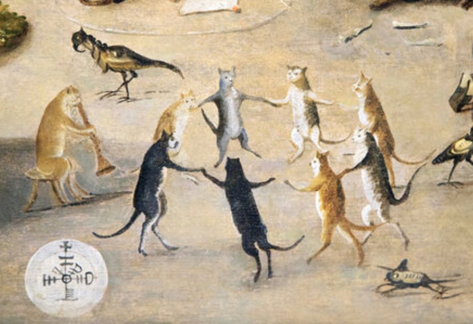 This is a closeup of one portion of the painting 'The Witches' Cove' where a circle of cats stands on hind legs, holding hands and dancing in a circle. One ginger cat sits in corner playing music for them on some kind of flute or recorder thing.
