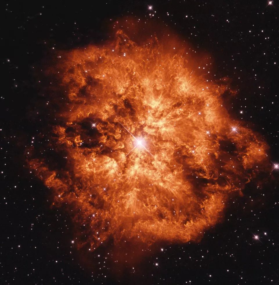 A central star within a bubble of excited helium atoms with space and some stars in the background. 