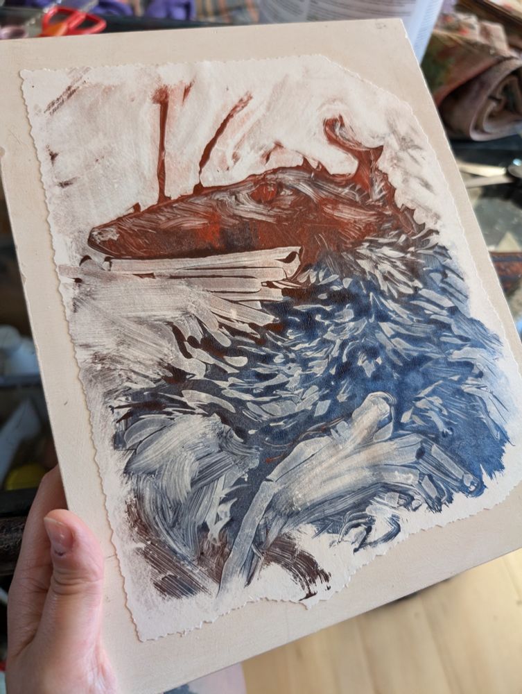 A monotype print with a jagged cut edge mounted to a wood panel