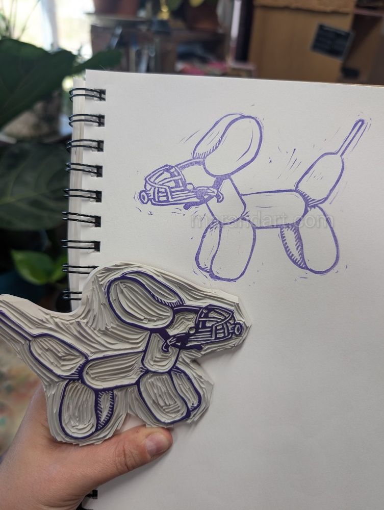 A carved linoleum block of a balloon dog with a metal cage muzzle on. It is printed as well in purple. 