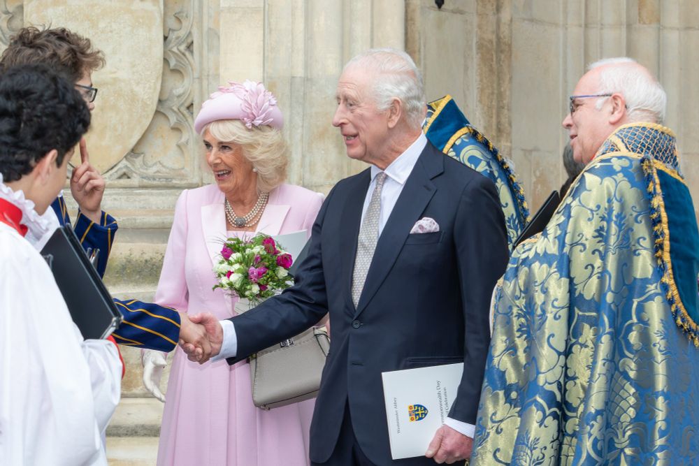 The King and Queen greet members of the Choir of Westminster Abbey outside the Abbey following a service