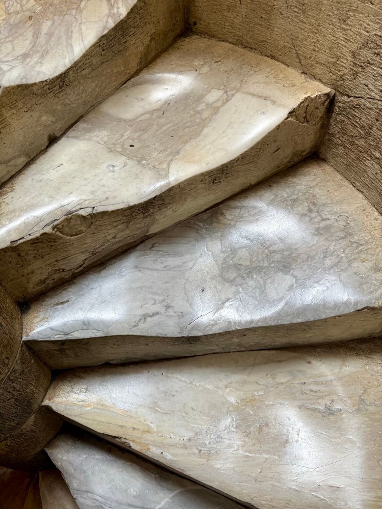 Worn steps on the Tower of Pisa