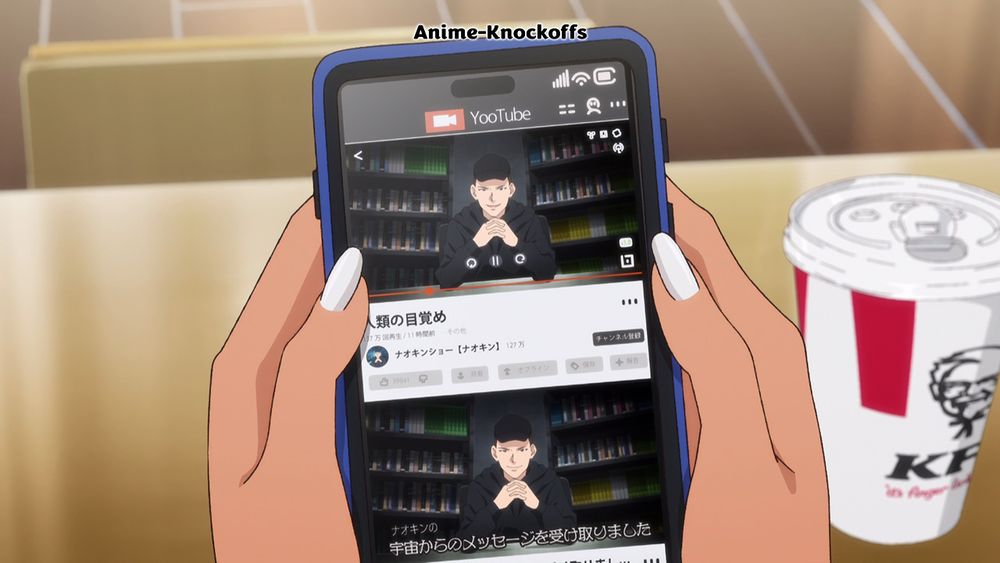 A girl holding a phone showing a streamer on the YooTube app.