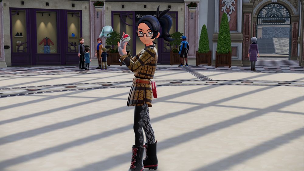 Une jeune femme à lunettes tenant une pokeball a la main portant un haut tartant avec une jupe tartant 