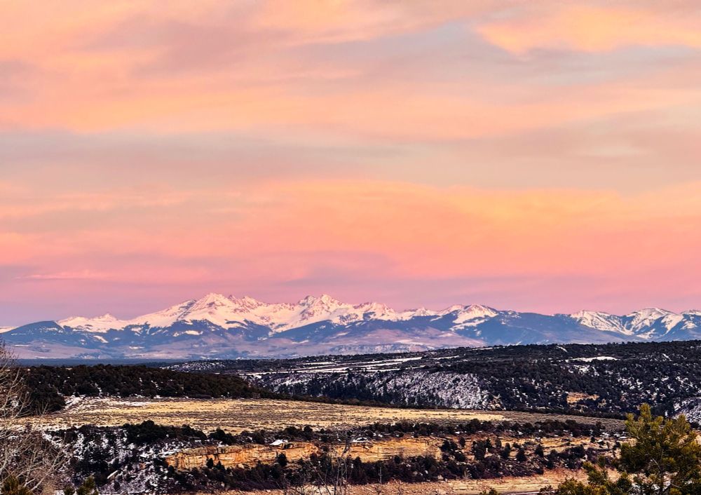 Aplpenglow on snowy mountains in Colorado.