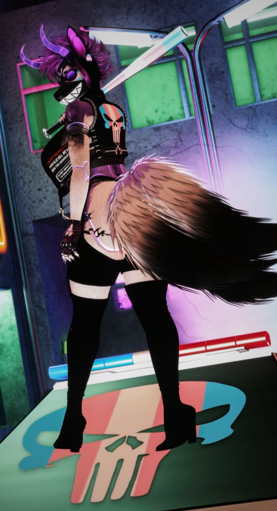 A white, purple, and black kitsune with only three tails out, masked and wearing black leather chaps and a leather biker vest with the Punisher logo on the back in trans pride colors. She’s got a metal baseball bat slung over one shoulder as she looks back over the other at the camera, standing on the hood of a police vehicle with the same logo sprayed on it. The mask has lots of teeth on it. 