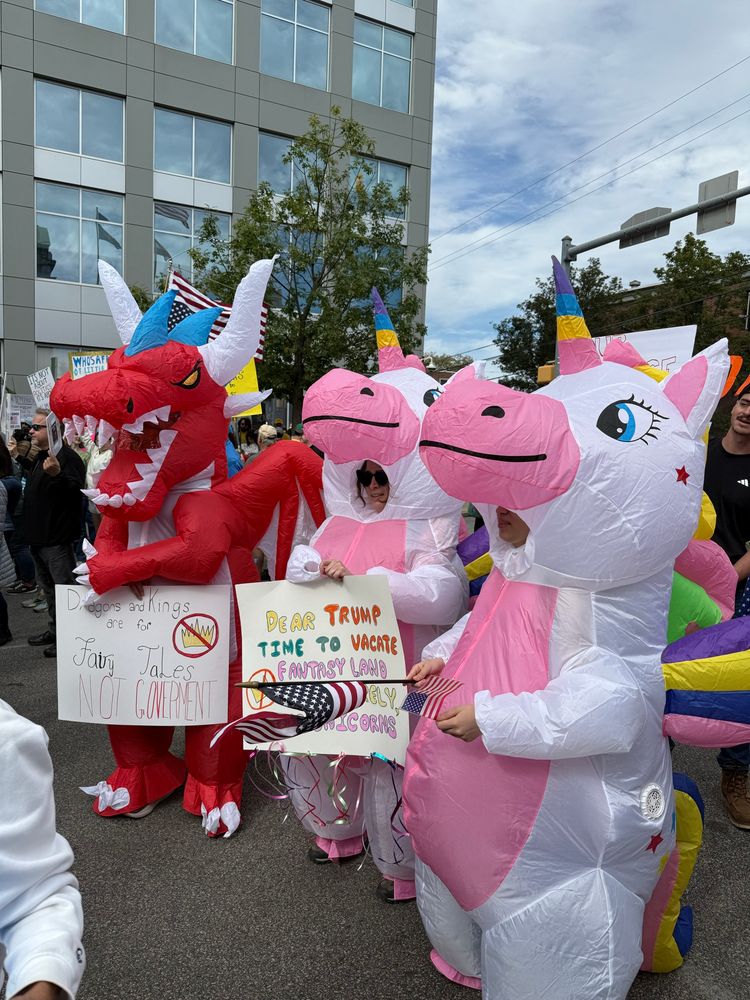 Protestors in inflatable costumes. 