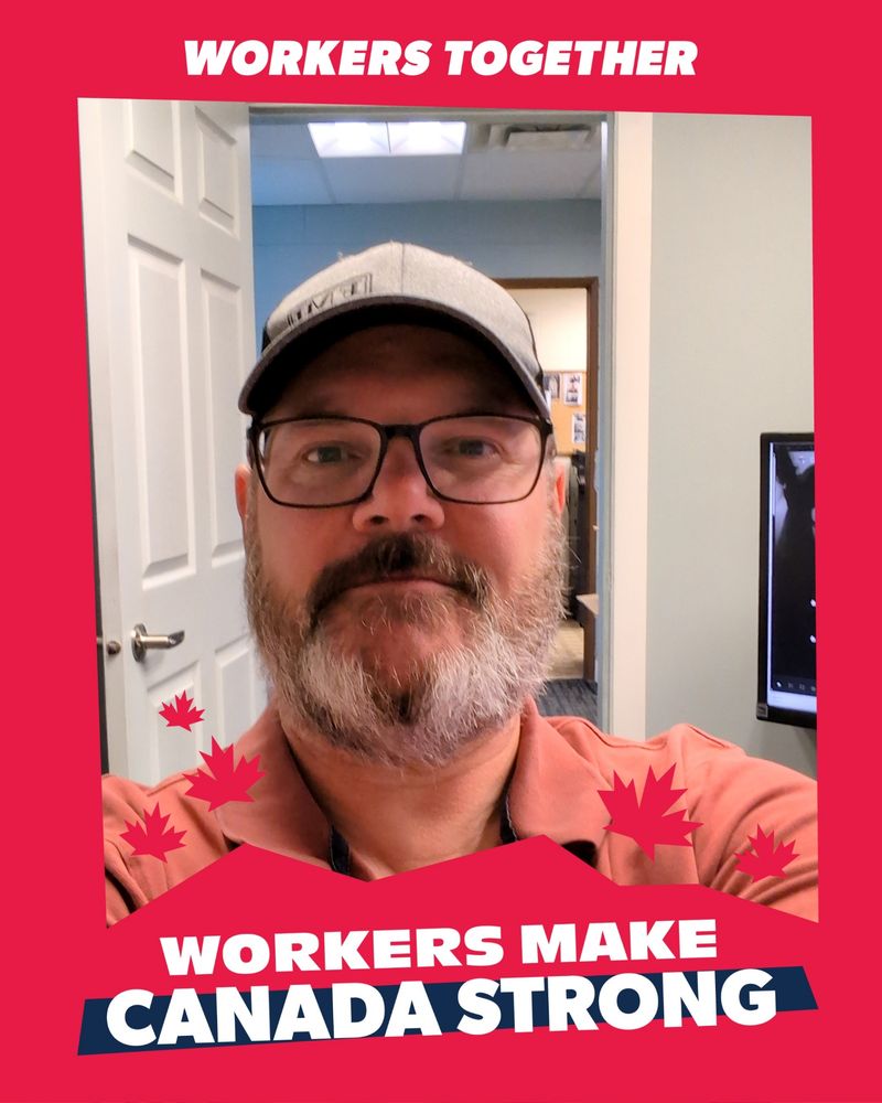 Hey, this is a pic of me with a digital frame that says "WORKERS TOGETHER" at the top, and "WORKERS MAKE CANADA STRONG" at the bottom.