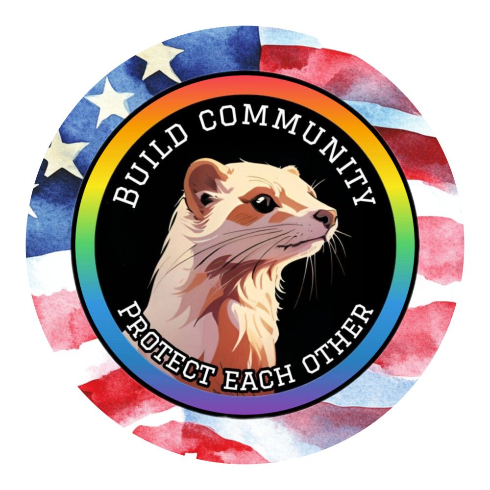 The image is a circular logo featuring an illustrated cream-colored mink with a confident, forward-facing expression. The animal is centered within a black circle that has a bright rainbow-colored border, symbolizing inclusivity and pride.

Encircling the mink, white text reads: “BUILD COMMUNITY” at the top and “PROTECT EACH OTHER” at the bottom. Behind the circle, the background shows a watercolor-style depiction of the American flag, with red and white stripes and blue with white stars.
