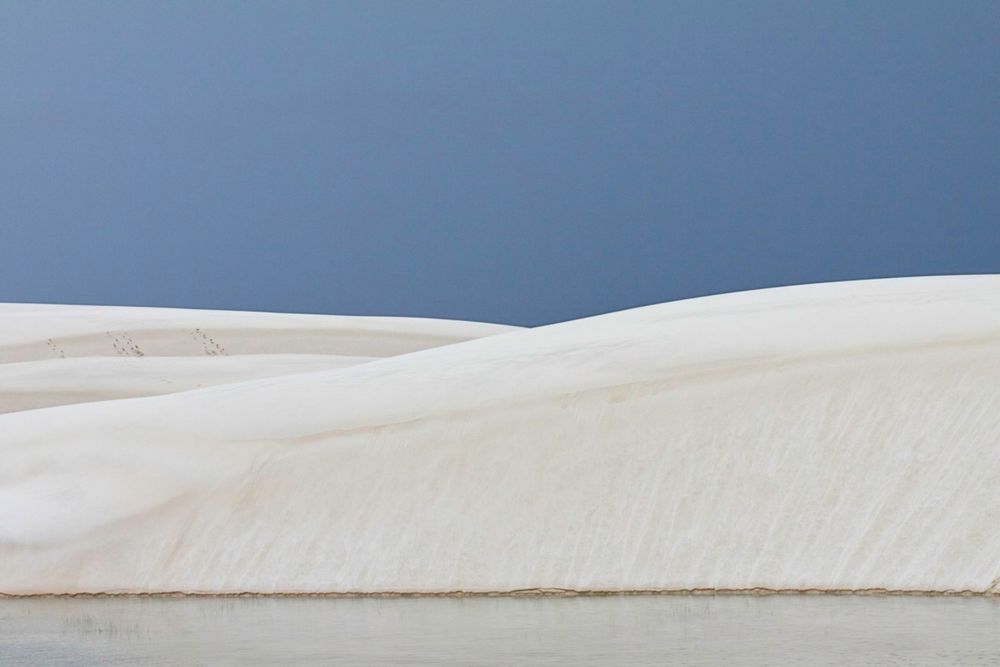 Dune with oasis in the Lençóis Maranhenses, Brazil.