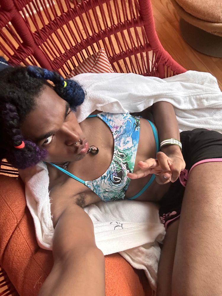 Bre relaxing in a giant…cradle? Egg? Thing