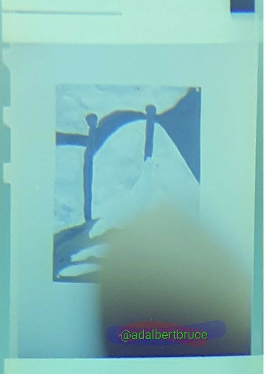 A de Chirico-inspired painting I once made; with an abstract figure, arch, and snow (partially blotted by my finger). -JBF
