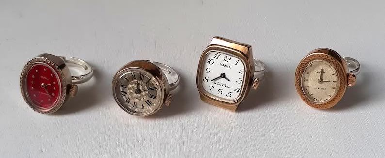 Four vintage ring watches 
