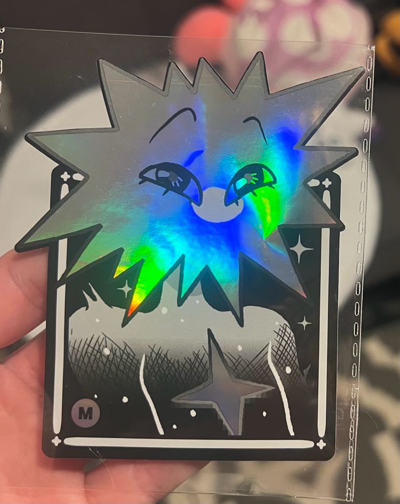 A sticker of Loop’s portrait from in stars and time 