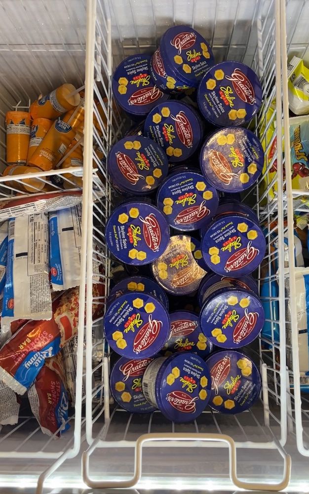 Cups of Skyline Chili Graeter’s Ice Cream sit in a freezer