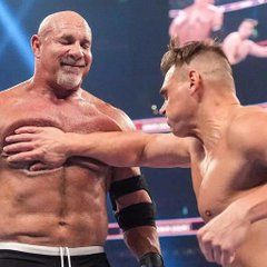 Goldberg smiling as Gunther chops the shit out of him