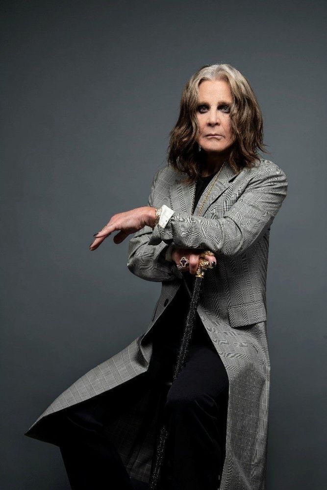 Ozzy Osbourne in a slick outfit.