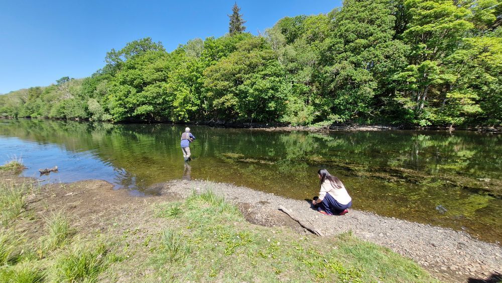 Eric Hope, Chair of Keswick Anglers filming with ITV border presenter Lucy Anderson
