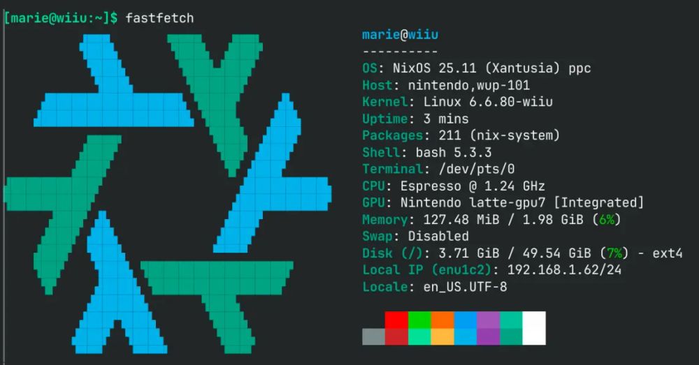 Screenshot of the console output of the command fastfetch. The NixOS logo is displayed as an ascii art on the left. Text on the right: marie@wiiu OS: NixOS 25.11 (Xantusia) ppc Host: nintendo,wup-101 Kernel: Linux 6.6.80-wiiu Uptime: 3 mins Packages: 211 (nix-system) Shell: bash 5.3.3 Terminal: /dev/pts/0 CPU: Espresso @ 1.24 GHz GPU: Nintendo latte-gpu7 [Integrated] Memory: 127.48 MiB / 1.98 GiB (6%) Swap: Disabled Disk (/): 3.71 GiB / 49.54 GiB (7%) - ext4 Local IP (enu1c2): 192.168.1.62/24 Locale: en_US.UTF-8
