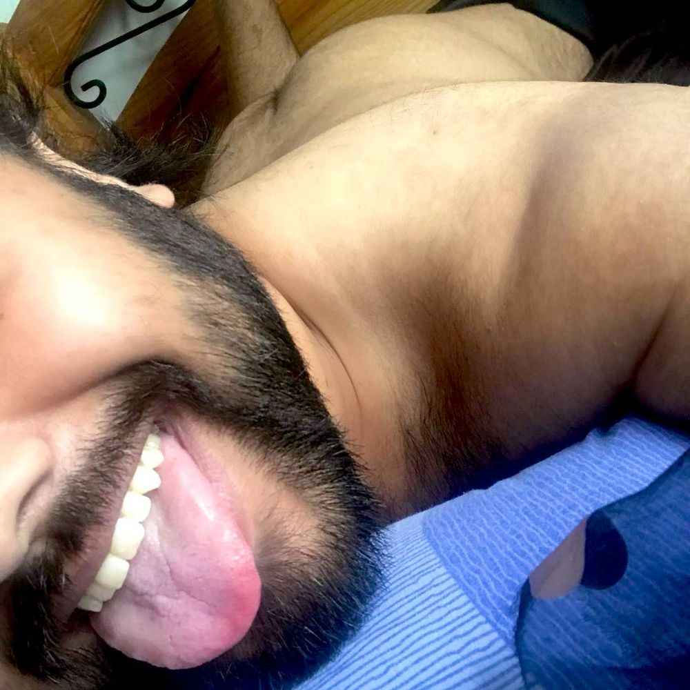 Hairy Asian bear with hairy ass out on the bed. 