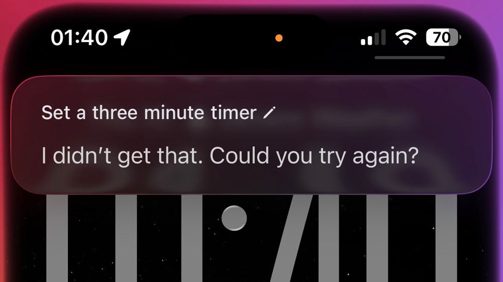Siri interface showing the spoken request “Set a three minute timer” followed by the response “I didn’t get that. Could you try again?”
