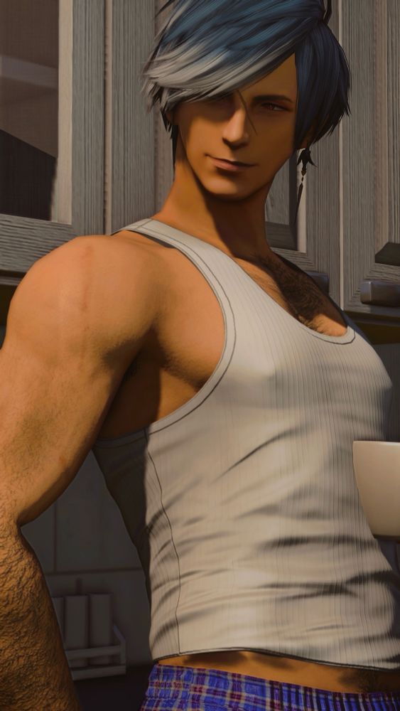 Granson stands in he and Orion’s kitchen with a mug of coffee. He is wearing a white tank and blue boxers with a soft smile on his face looking off screen (at Orion)