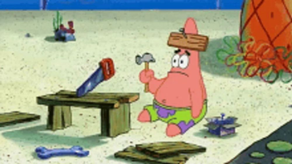 patrick star from spongebob squarepants holding a hammer and a saw