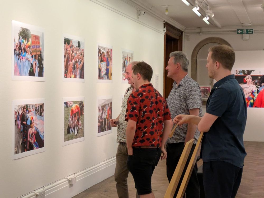 Hue and Stephen looking at the Martin Parr exhibition