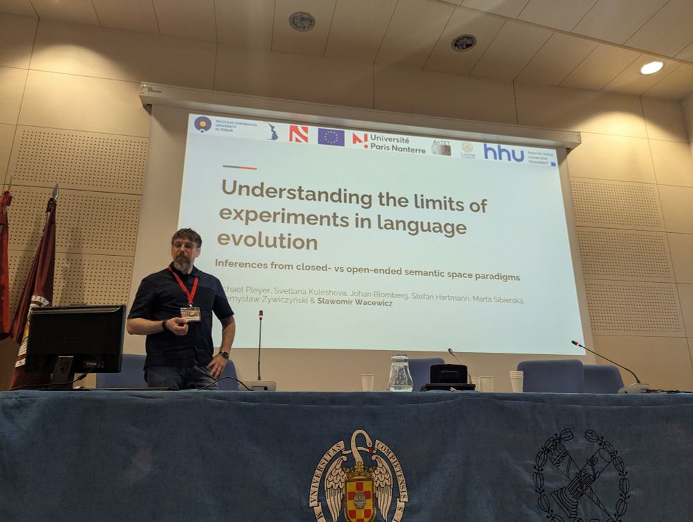 Sławek in front of the title slide 
