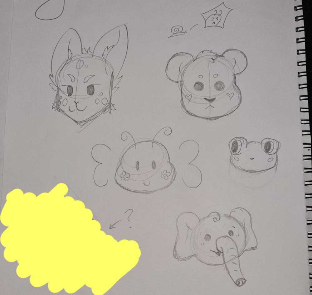 5 doodles: a wolf/fox, a bear, a frog, a butterfly, and an elephant. There is also a very small angry snail