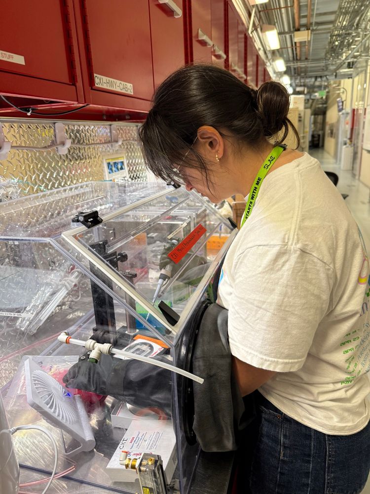 Scientist using a humidity-controlled box to set up experiments