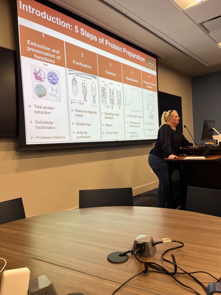Scientist from Stanford Chrissy Tarver presenting on protein preparation