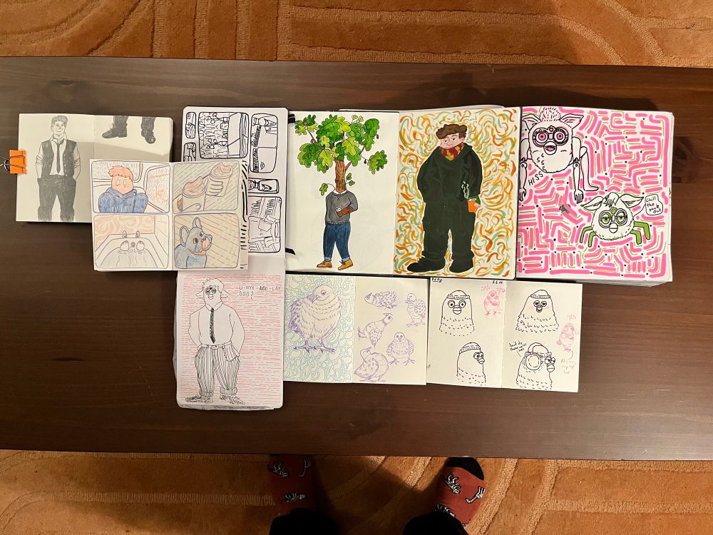 A selection of sketchbook pages with drawings of furbies, pigeons, dogs and Kirstie Ken 