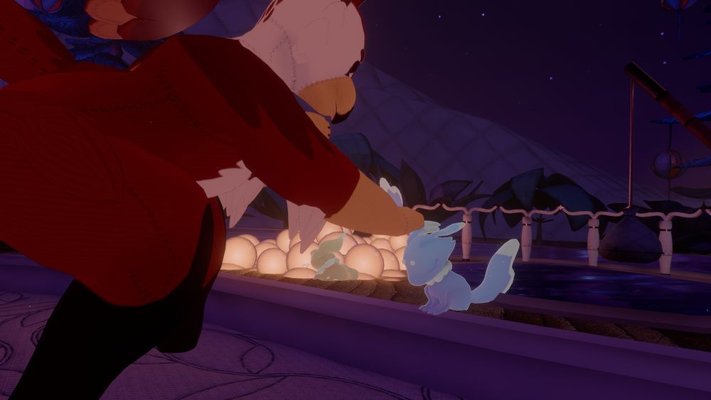VRChat screenshot from Furality Somna of a plushie red gryphon petting a small blue carbuncle like creature with wing ears.