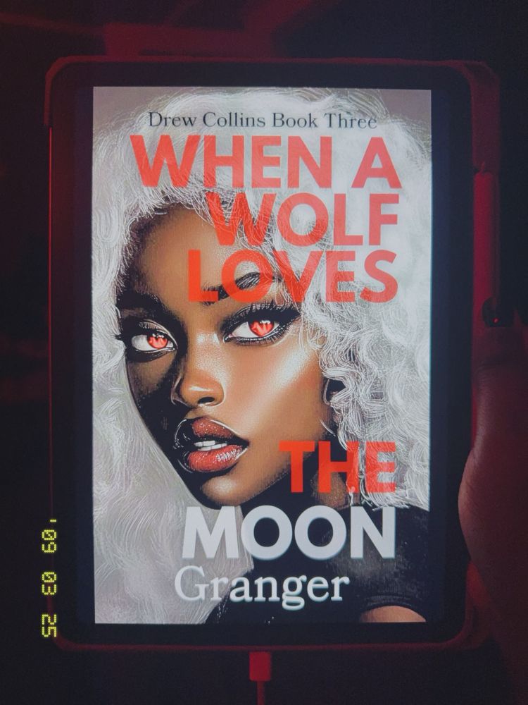 book cover
drew collins book three (black text) 
when a wolf loves the (red text) moon (gray text) 
beautiful brown babe with white hair, red eyes, red lip, thick eyelashes 